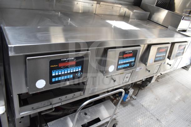 NEW 2021 Texino 28ft food trailer interior, features Ultrafryer 4-bay fryer with Ultrastat 23 controls, stainless steel finish.