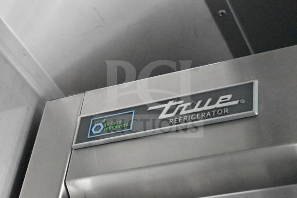True refrigerator label on 2021 Texino 28ft food trailer, featuring natural refrigerant, part of full refrigeration suite.