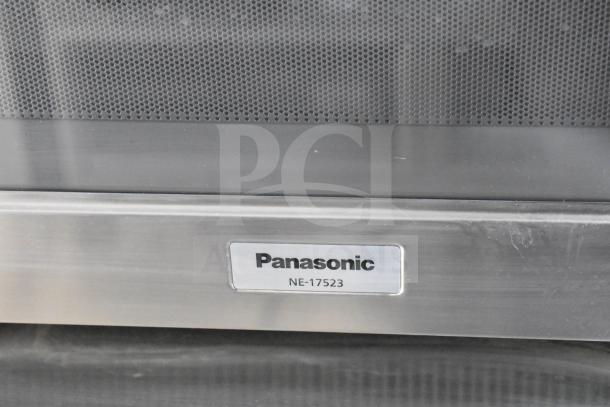 Metal label on appliance reads "Panasonic NE-17523," indicating the model number and brand.