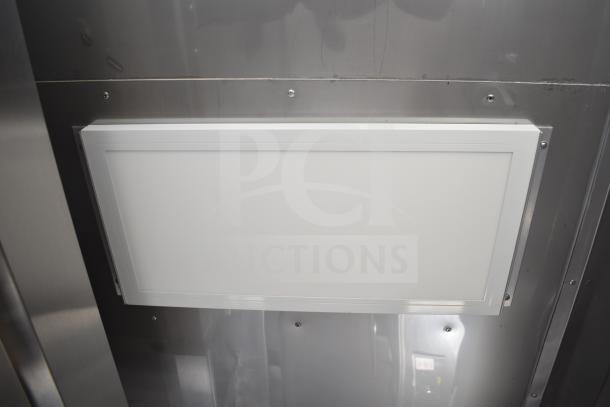 Interior view of the 2021 Texino food trailer showcasing a CaptiveAire hood in pristine condition.