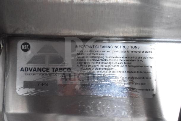 Advance Tabco cleaning instructions label for stainless steel maintenance, highlighting proper cleaning methods and precautions.