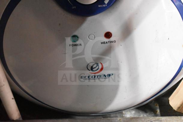 ECCOTEMP control panel with power and heating indicators, labeled "The Future of Efficiency." Shows slight wear.