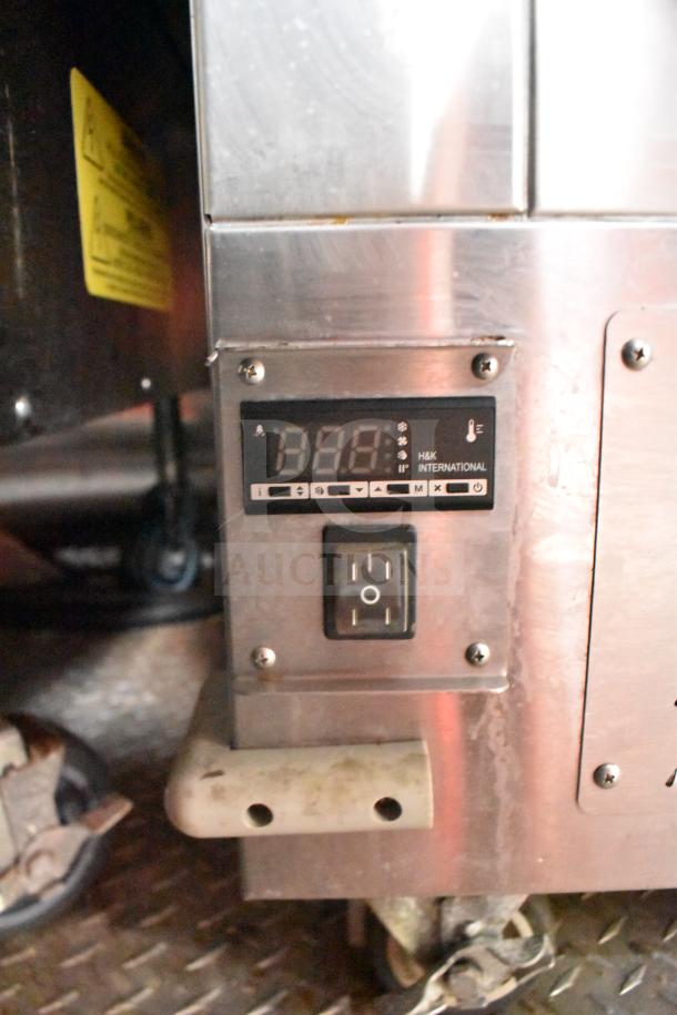 Control panel of Henny Penny Electric Fryer inside a 2021 Rock Solid Cargo 28ft food trailer, showing digital display and controls.