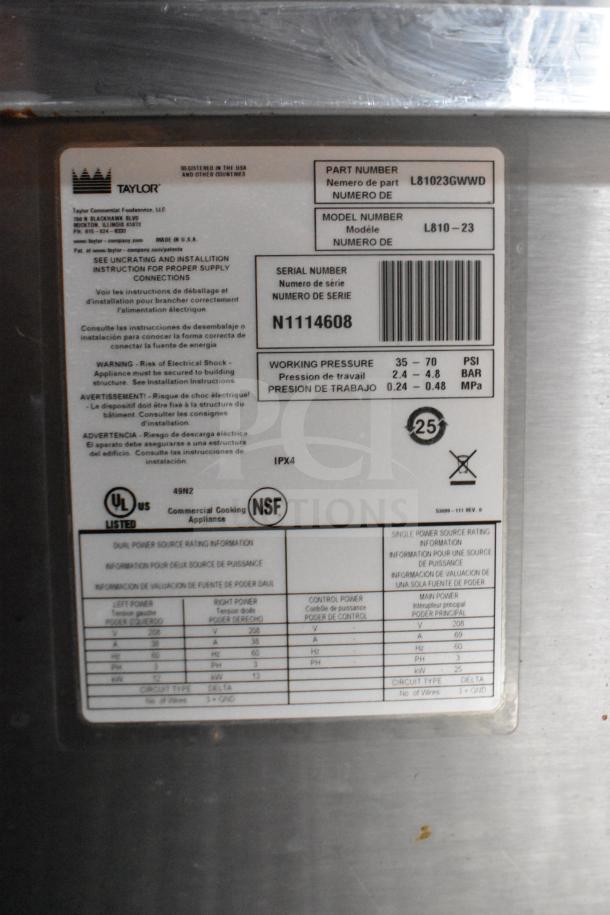 Label on a Taylor commercial cooking appliance showing part number L81023GWWD, model L810-23, serial N1114608.