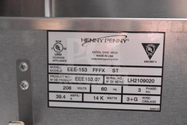 Henny Penny Electric Fryer model EEE-153 label showing serial number LH2109020, 208 volts, 60 Hz, 39.4 amps.