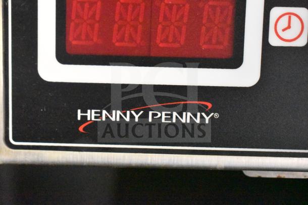 Henny Penny electric fryer control panel with digital display and brand logo, integrated in 2021 Rock Solid Cargo food trailer.