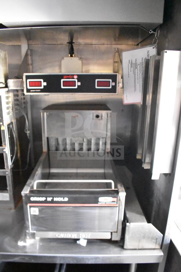 2021 Rock Solid Cargo 28ft trailer interior with Henny Penny fryer console, visible fry holder, and Wendy's digital controls.