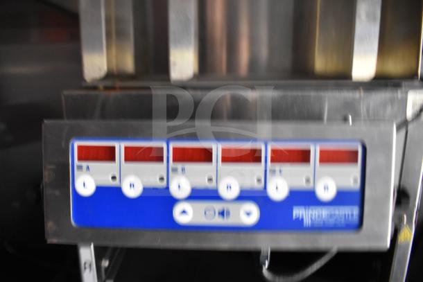 Control panel of the 2021 Rock Solid Cargo 28ft Commercial Food Trailer, featuring operational buttons and display.