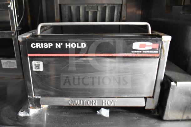 Carter-Hoffmann Crisp N' Hold unit in Rock Solid Cargo 28ft food trailer. Features "Caution Hot" label and QR code.
