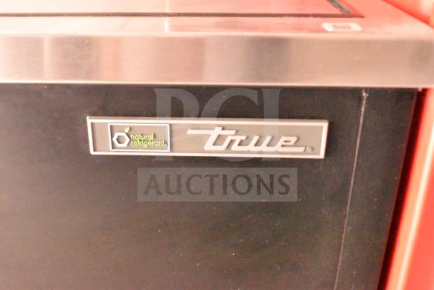 Close-up of a True refrigeration unit label with "natural refrigerant" logo on a 2021 Rock Solid Cargo food trailer.