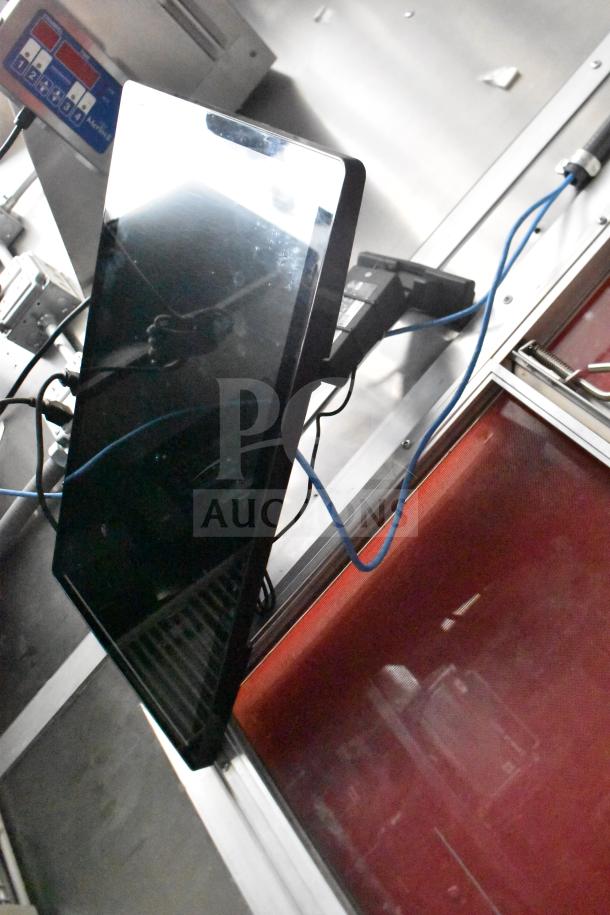 Interior view of 2021 Rock Solid Cargo 28ft food trailer showing electronic controls and wiring setup.