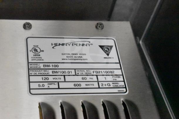 Label on Henny Penny electric fryer, model BW-100. Features: 120V, 60Hz, 1 phase, 600W, 5 amps. Made in USA.