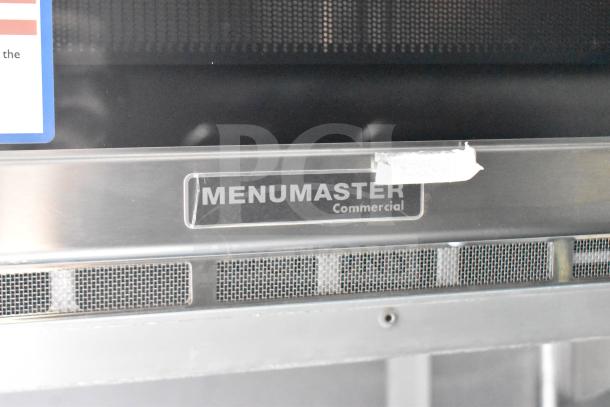 Close-up of a commercial Menumaster appliance inside a 2021 Rock Solid Cargo Food Trailer. Visible label reads "Menumaster Commercial."