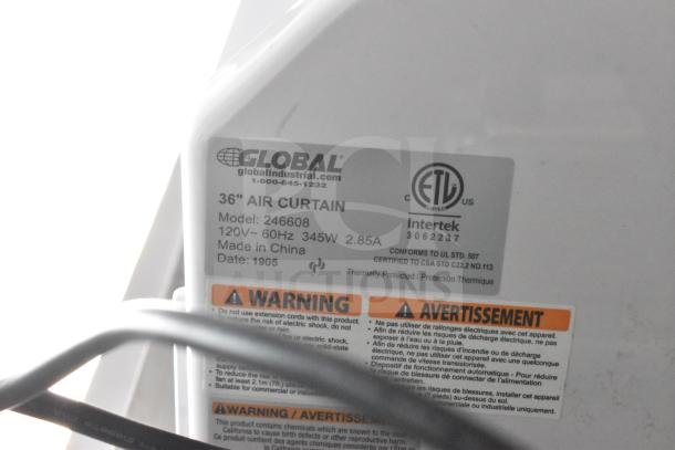 Label on a Global 36" Air Curtain, model 246608, 120V, 60Hz, 345W, Made in China. Features safety warnings.
