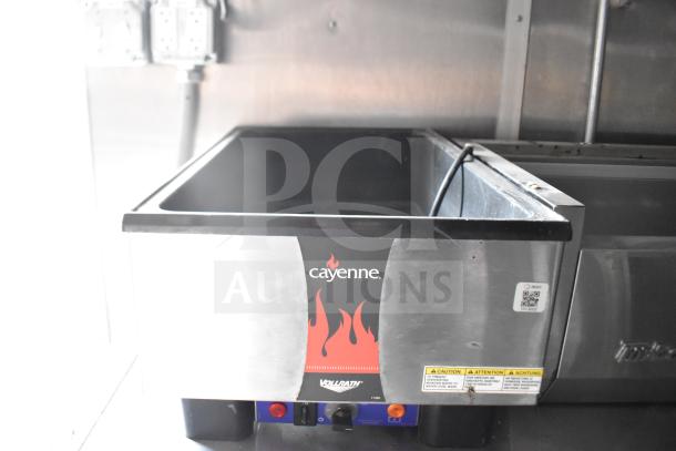 2021 Rock Solid Cargo food trailer interior with Cayenne by Vollrath warmer. Features safety and warning labels.