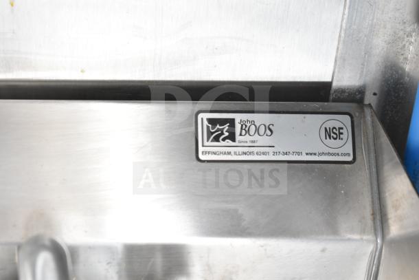 NBRHD Kitchens Food Trailer label showing John Boos branding and NSF certification, indicating quality and standards.