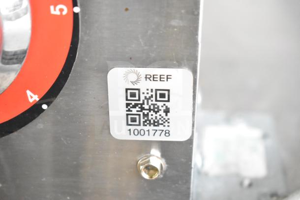 QR code label on NBRHD Kitchens Ghost Kitchen Food Trailer, marked "REEF" and serial number "1001778".