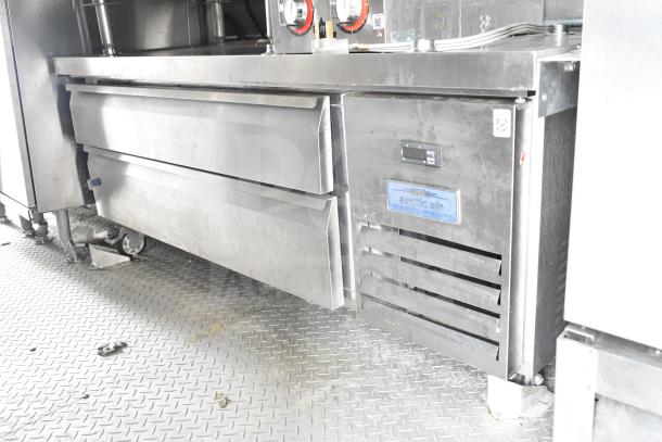 NBRHD Kitchens food trailer featuring Arctic Air refrigeration, dual Pitco fryers, and CaptiveAire hood, in good condition.