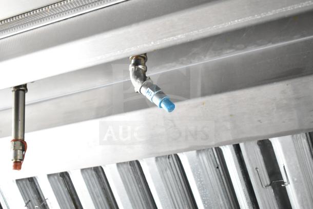 NBRHD Kitchens Ghost Kitchen food trailer ventilation system detail with visible fittings and metal hood.