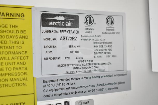 Arctic Air commercial refrigerator label showing model AST72RZ, refrigerant R290, and design pressures.