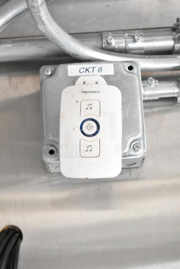 Electrical control panel with TeckNet device labeled "CKT 6" in a food trailer setting.