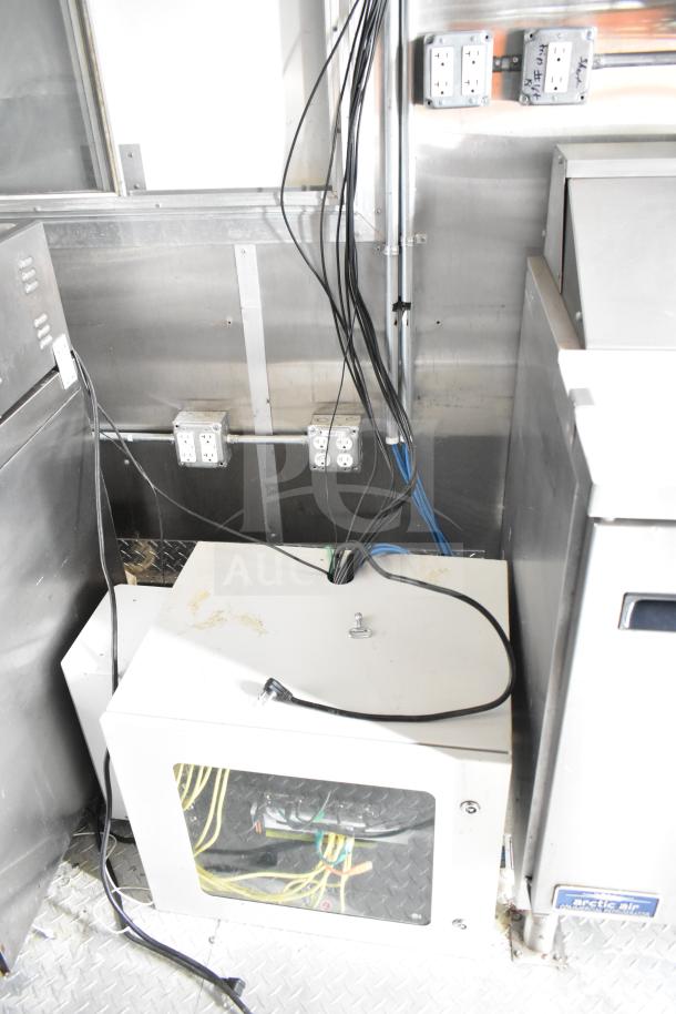 NBRHD Kitchens food trailer interior showing wiring, Arctic Air unit, and electrical outlets; clean condition.
