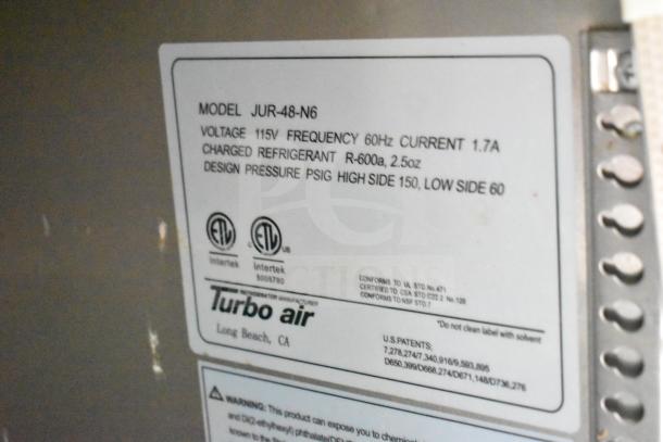 Turbo Air model JUR-48-N6 label showing voltage 115V, frequency 60Hz, current 1.7A, R-600a refrigerant, design pressure high side 150.
