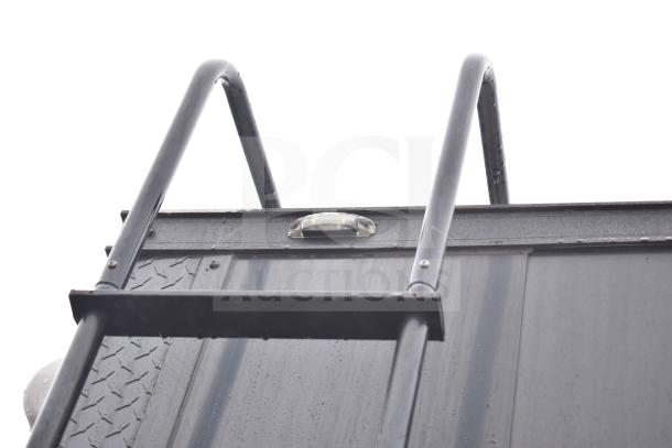 All-black Southern Dimensions Group mobile commissary trailer, ladder and roof detail, minor wear visible, 2020 model.
