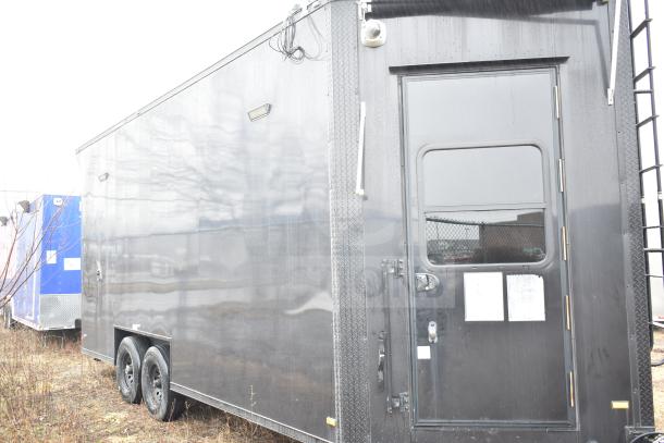 2020 Southern Dimensions 8.5' x 20' mobile commissary trailer, all-black, tandem axle, 14,000 lb GVWR, visible exterior door.