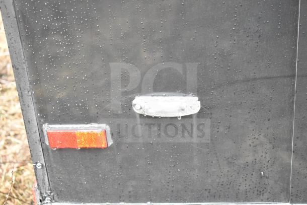 2020 Southern Dimensions Group 8.5' x 20' mobile trailer, all-black with visible tail light and side marker.