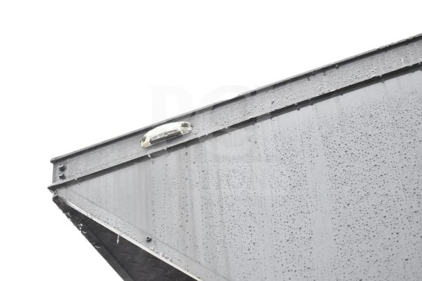 2020 Southern Dimensions Group 8.5'x20' all-black trailer exterior view, rain-dampened surface showing good condition.