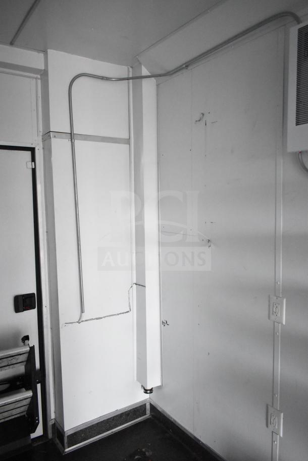 2020 Southern Dimensions Group 8.5' x 20' mobile commissary trailer interior, showing wall wiring and outlets, in good condition.