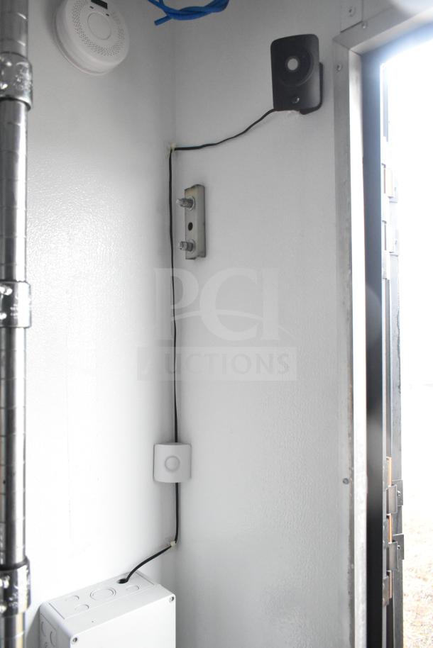 Interior view of 2020 Southern Dimensions Group 8.5' x 20' mobile trailer. Features visible wires and control panel.