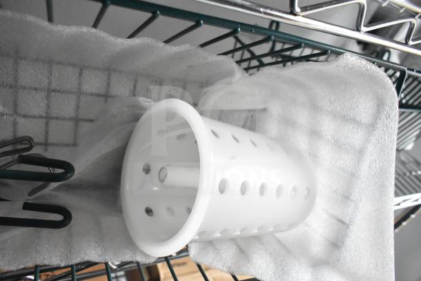 2020 Southern Dimensions mobile commissary trailer interior showing wire shelving and a white plastic perforated cylinder.