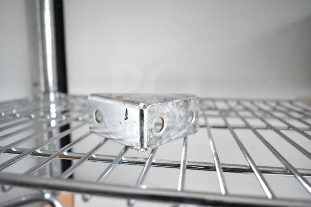 Close-up of wire shelving inside a 2020 Southern Dimensions Group mobile trailer, showcasing sturdy chrome construction.