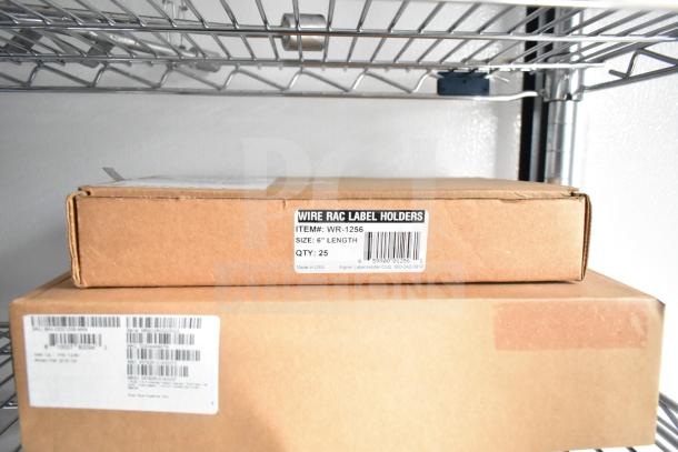 Boxes of Wire Rac Label Holders on wire shelf. Labels indicate item number WR-1256, 6" length, quantity 25.