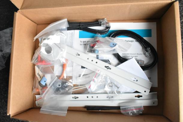 Box with assembly components and tech accessories for Southern Dimensions Group trailer. Labels show part numbers.