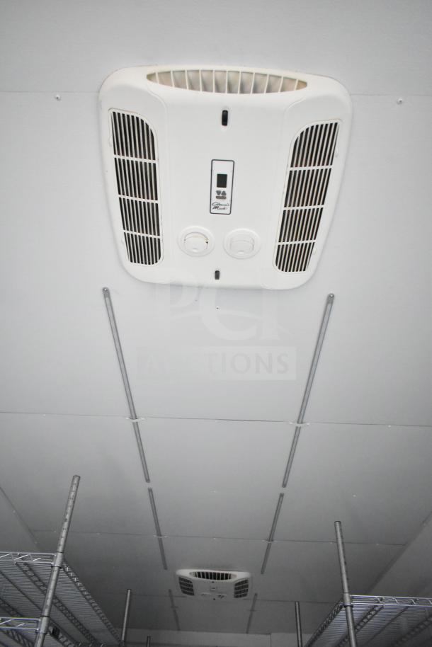 Ceiling view of 2020 Southern Dimensions Group trailer showing Coleman Mach AC unit and wire shelving supports.