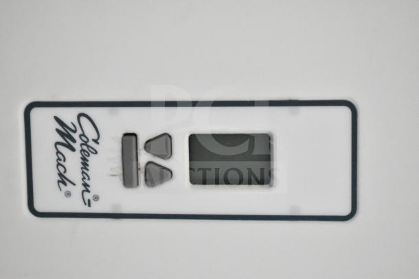 Coleman Mach AC control panel for 2020 Southern Dimensions Group Mobile Trailer, featuring rectangular screen and buttons.