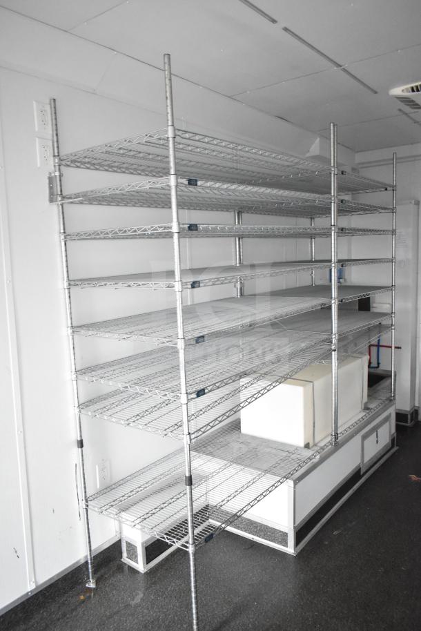 Wire shelving inside a 2020 Southern Dimensions Group mobile commissary trailer, featuring ample storage space.