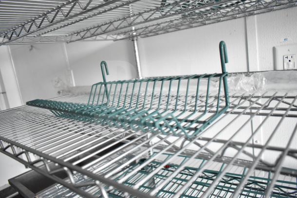 Interior wire shelving of 2020 Southern Dimensions Group mobile trailer, featuring durable chrome construction and versatile design.
