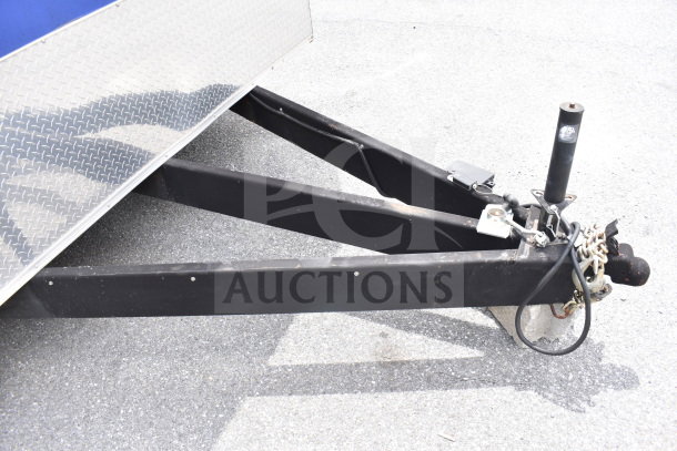 Rock Solid Cargo 28ft food trailer hitch and frame. Diamond plate exterior, new condition. VIN: 7H2BE2837ND041749.