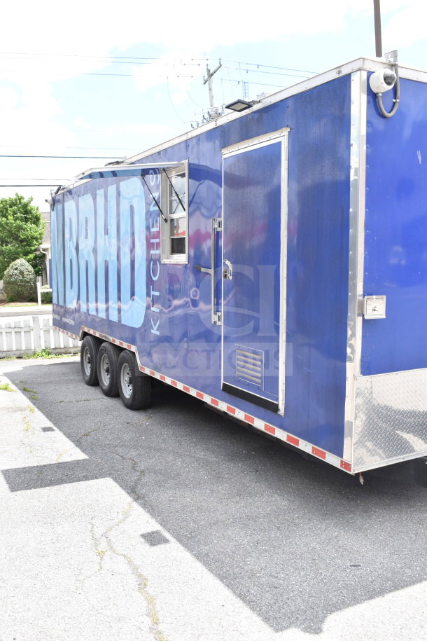 New 2021 Rock Solid Cargo 28ft blue food trailer with CaptiveAire hood, refrigeration, Nieco charbroiler. VIN: 7H2BE2837ND041749.