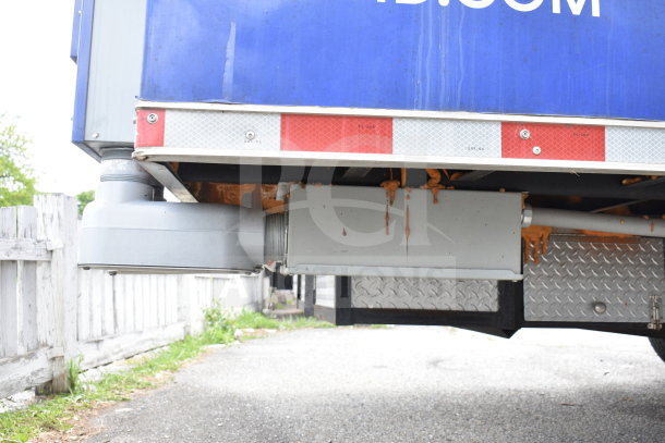 New 2021 Rock Solid Cargo 28ft food trailer section with visible undercarriage and ventilation duct.
