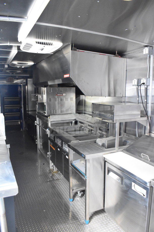 New 2021 Rock Solid Cargo 28ft food trailer with CaptiveAire hood, Nieco charbroiler, refrigeration package. VIN: 7H2BE2837ND041749.