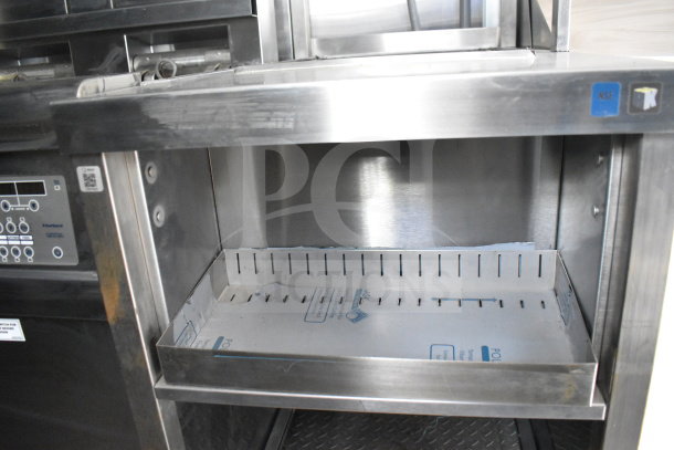 New 2021 Rock Solid Cargo 28ft food trailer featuring CaptiveAire hood, refrigeration, and Nieco charbroiler.