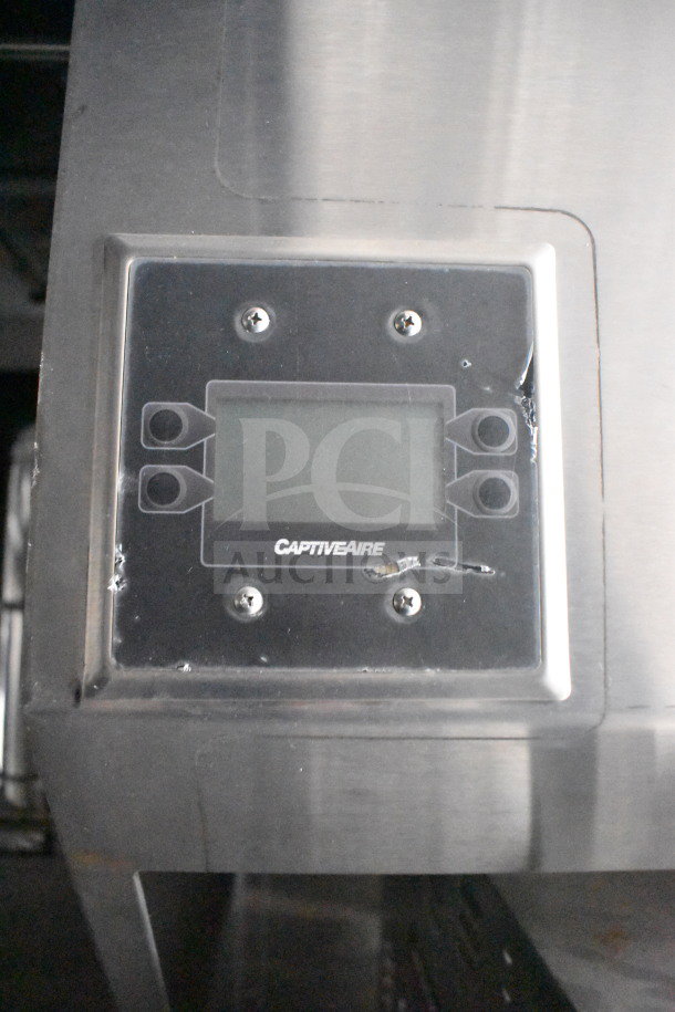 CaptiveAire control panel on a new 2021 Rock Solid Cargo 28ft food trailer, featuring refrigeration and charbroiler systems.