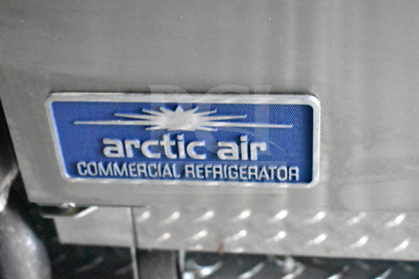 Arctic Air commercial refrigerator label on 2021 Rock Solid Cargo food trailer, featuring stainless steel finish.