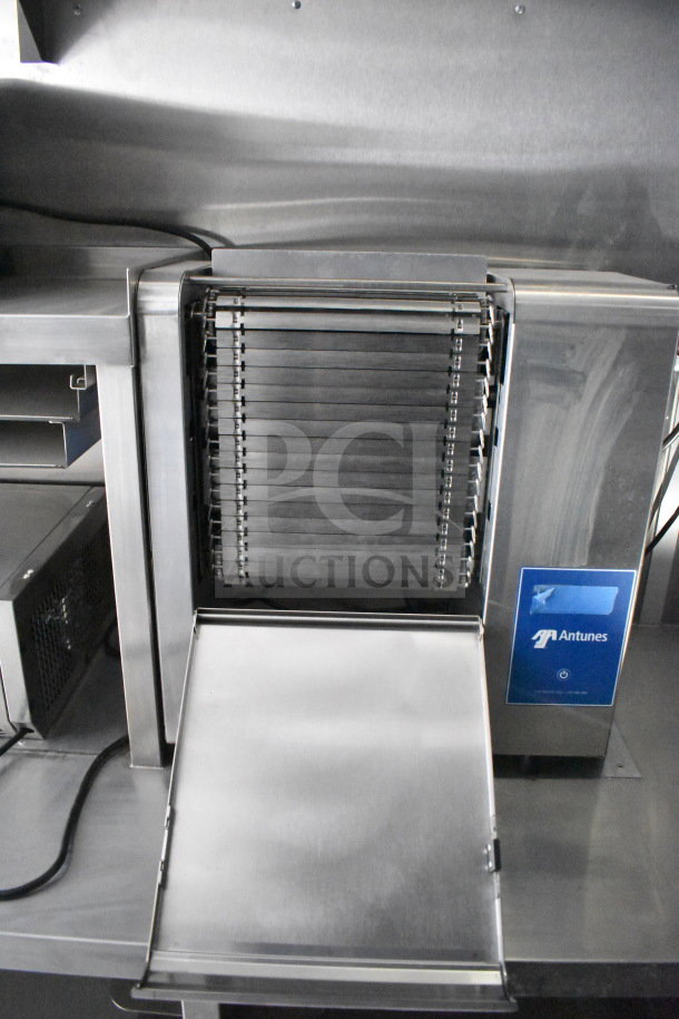 Stainless steel Antunes food toaster in new condition, part of a 2021 Rock Solid Cargo food trailer setup.
