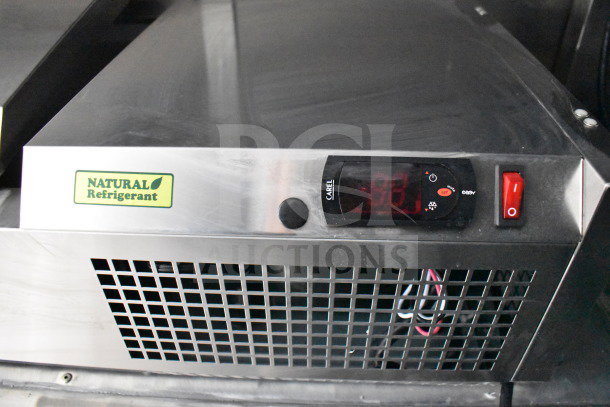 New 2021 Rock Solid Cargo food trailer refrigeration unit with Carel digital display and "Natural Refrigerant" label.